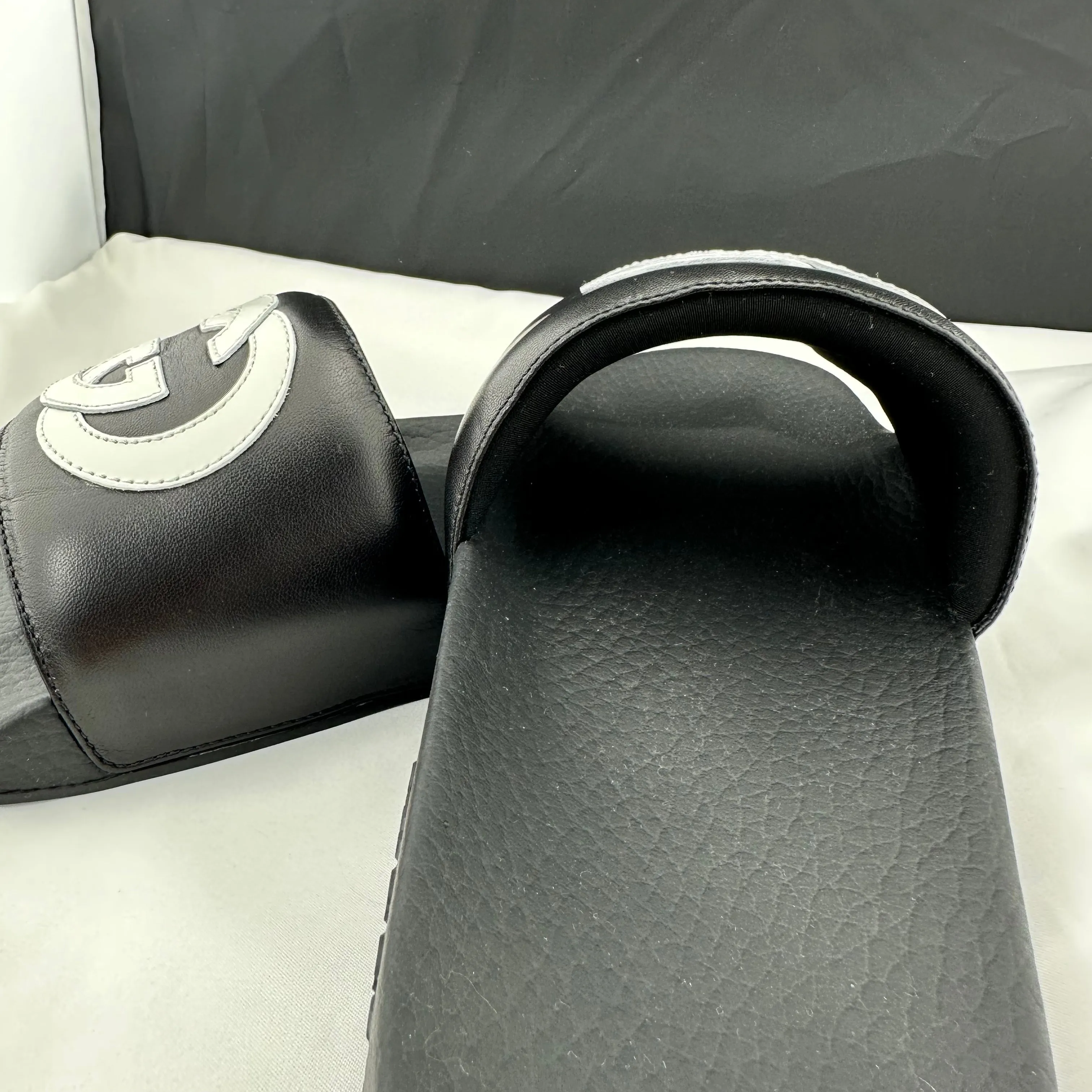 Gucci Women's Black Slides with White Interlocking GG