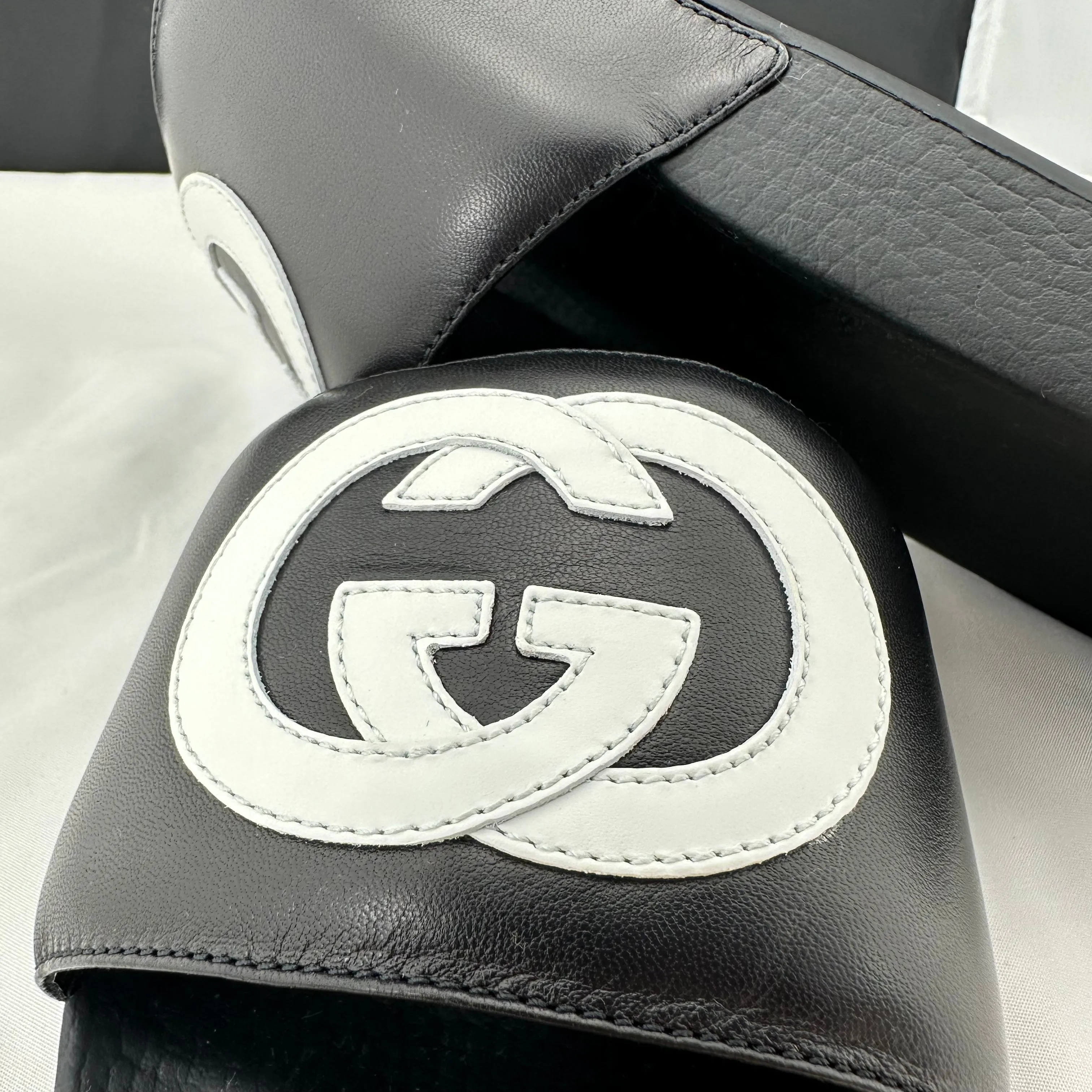 Gucci Women's Black Slides with White Interlocking GG